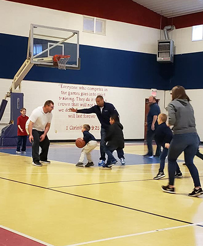 Physical Education - students and staff playing on the court