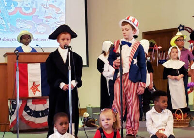 Students participating in a patriotic program at school